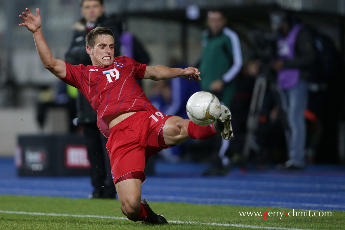 Mathias JAENISCH of Luxembourg trying to keep the ball in the game during the WM qualification game against Israel