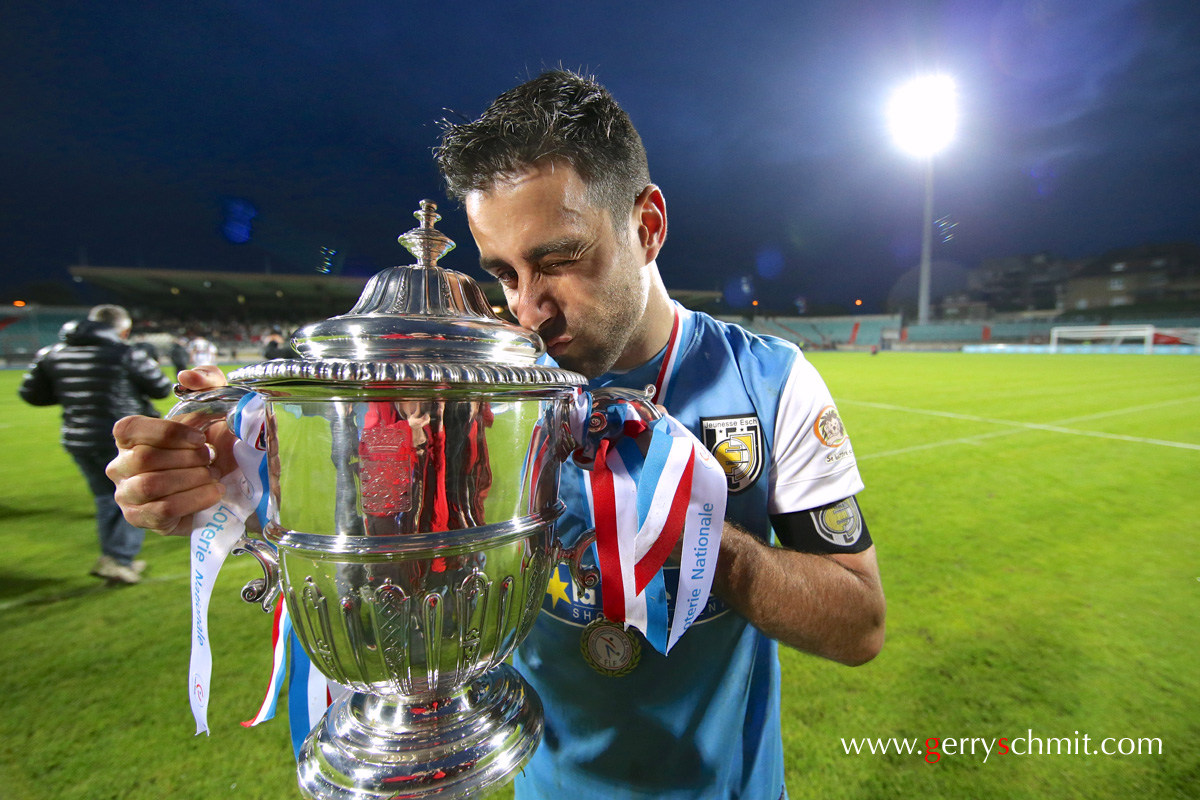 Marc OBERWEIS (Jeunesse Esch) kisses the Cup after winning the final against Differdange 03