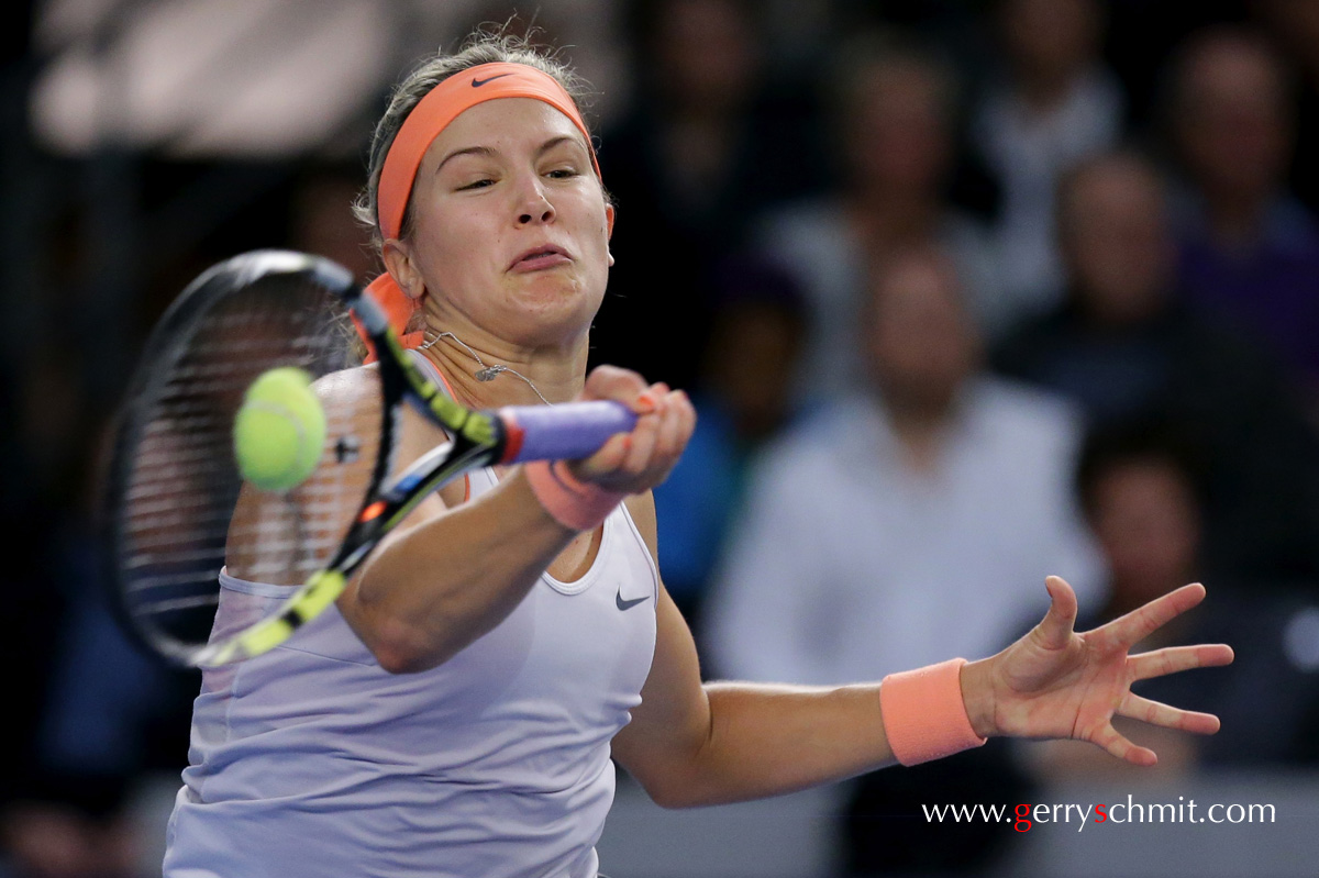 Eugenie Bouchard of Canada strikes the ball during her game against Andrea Petkovic 
