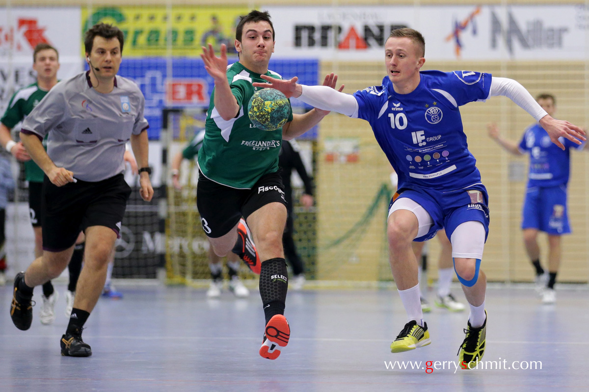 Duell between Pol Freres and Mikel Molitor during the handballgame HB Bascharage - HB Diddeleng
