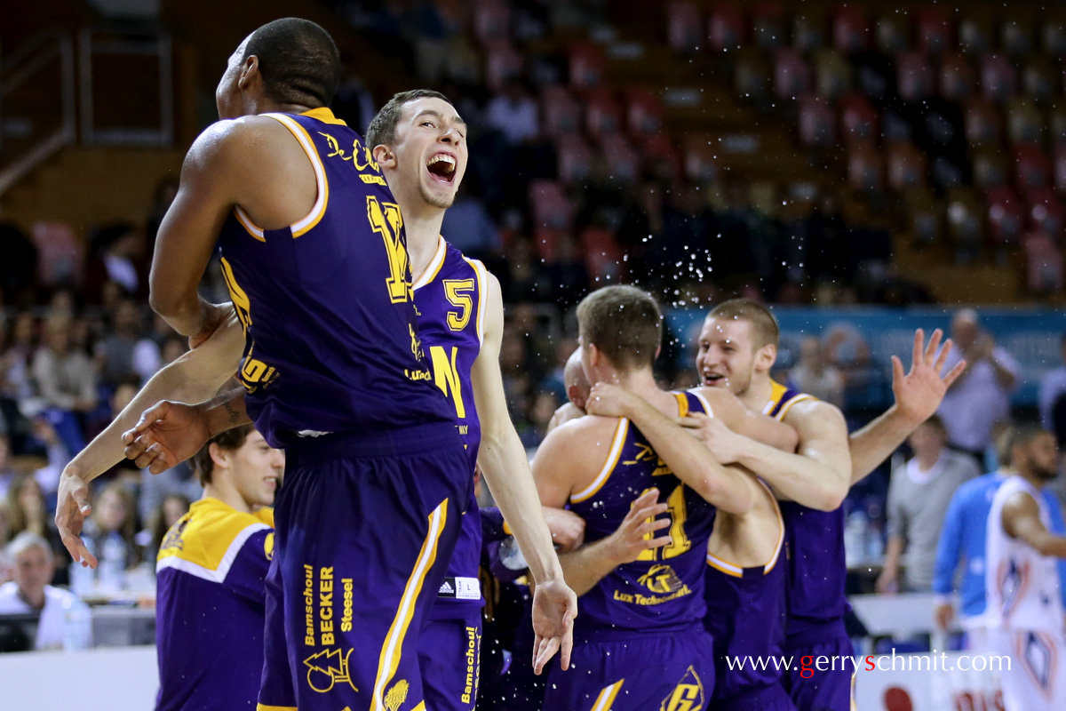 Bob Melcher and Billy McDaniel celebrate their victory against AB Contern @ Cup finals in Basketball