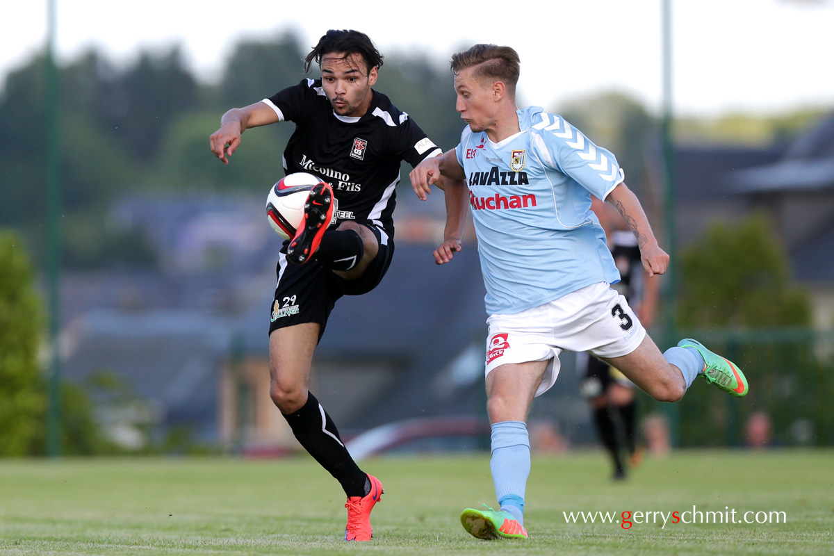 Duel between Toni Luisi (D03) an Romain Ney (F91)