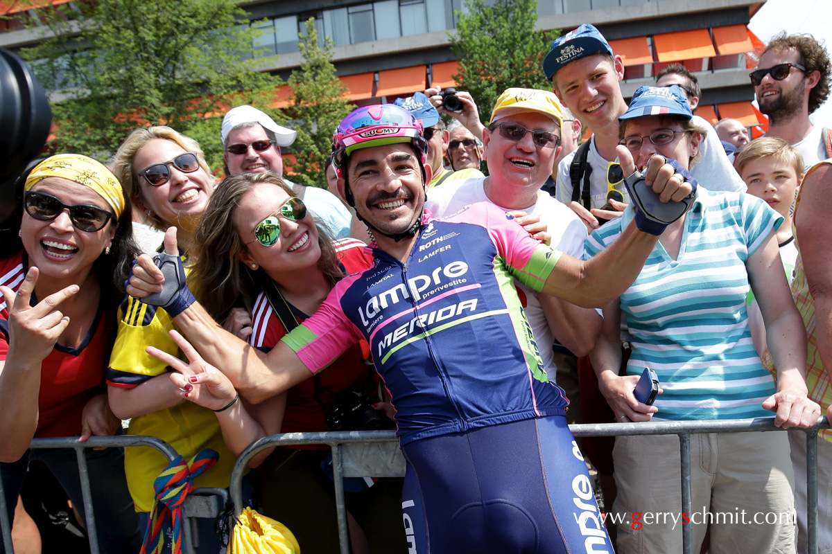 Jose Serpa (Lampre Merida) is posing with Fans before start in Utrecht @ stage Tour of TDF 2015