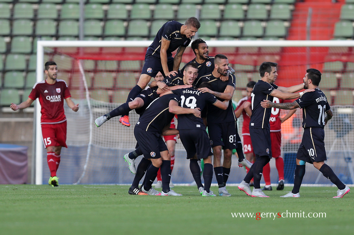 Players of Dinamo Zagreb react after scoring against Fola Esch during CL Qualification