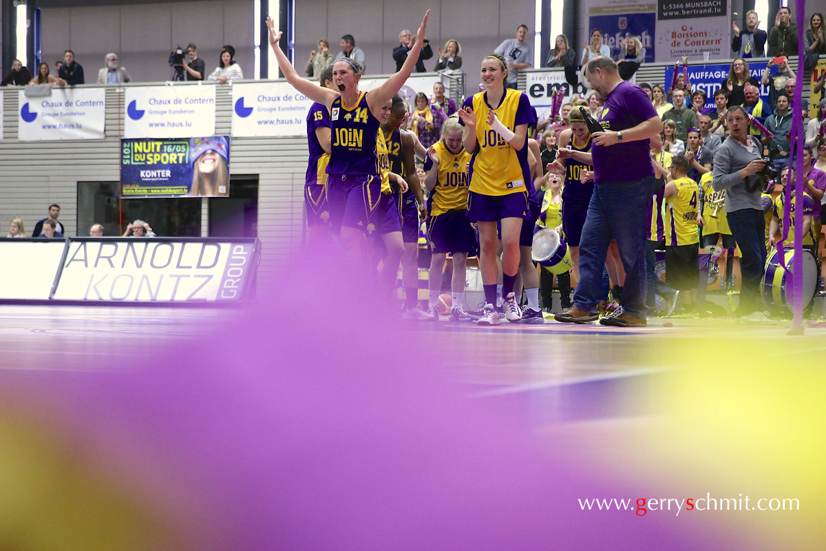 Players of Amicale Steinsel react after winning the national championship title