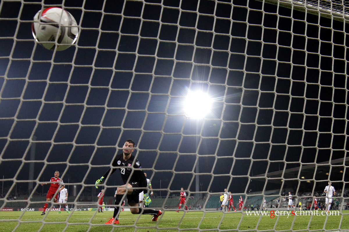 Mario Mutsch of Luxembourg scores the goal of 1-3 against Slovakia during EM Qualification game