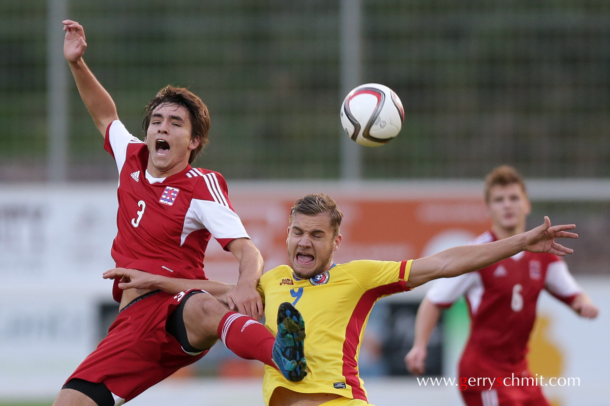 Cedric Sacras of Luxembourg against Georges Puscas of Rumania during U21 EM group stage game