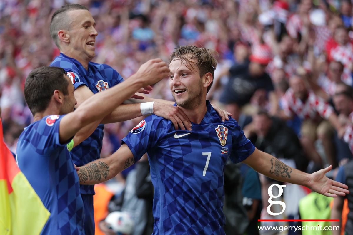 Ivan Rakitic of Croatia celebrates his goal of 2-0 lead with Darijo Srna an Ivan Perisic