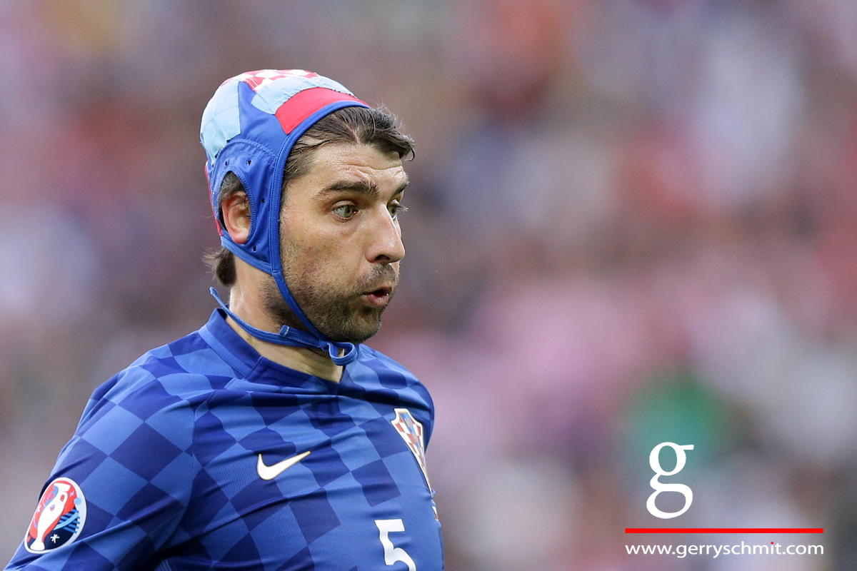 Portrait of Verdan Corluka (Croatia) who wears a head protection after an injury