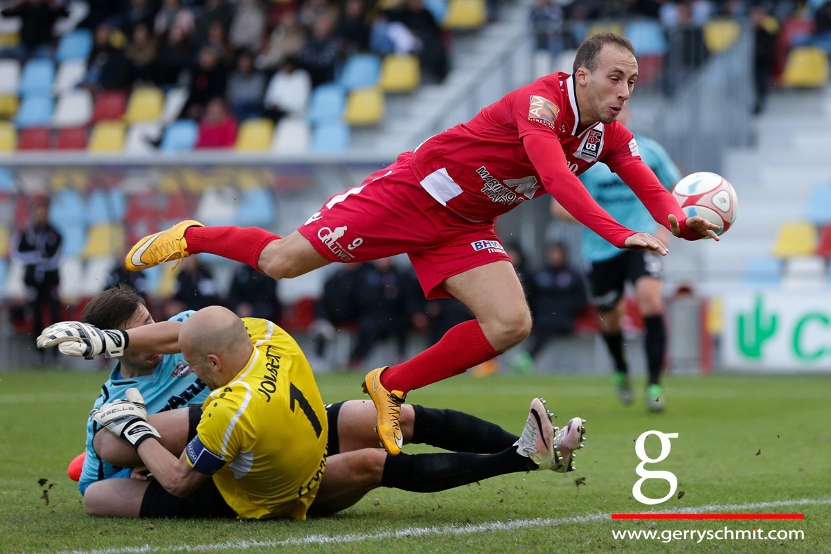 Omar Er Rafik challenges Jonathan Joubert and Kevin Malget during BGL Ligue Game FCD03 - F91