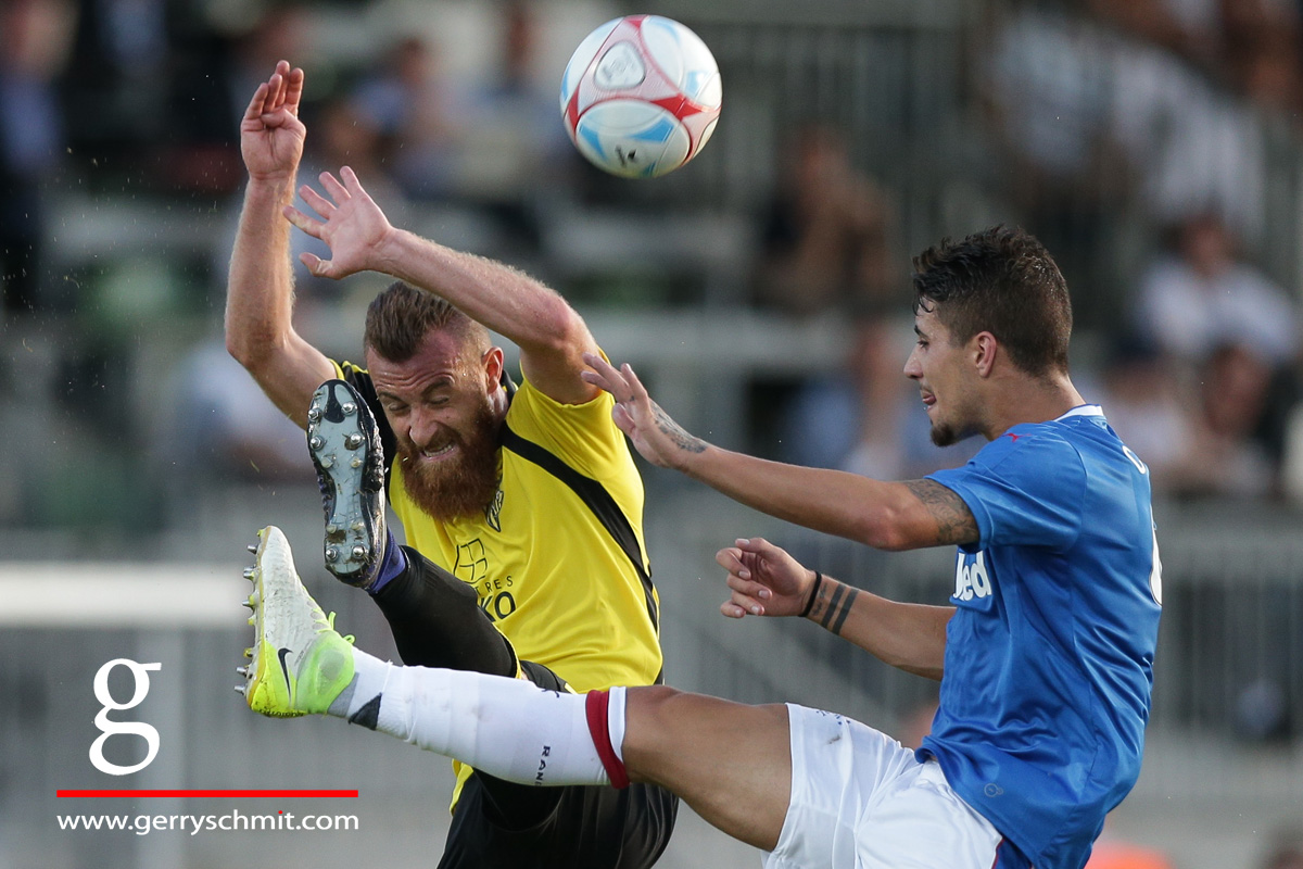 Duel between Aleksandre Karapetian (Progres) and Fabio Cardoso (Rangers FC)