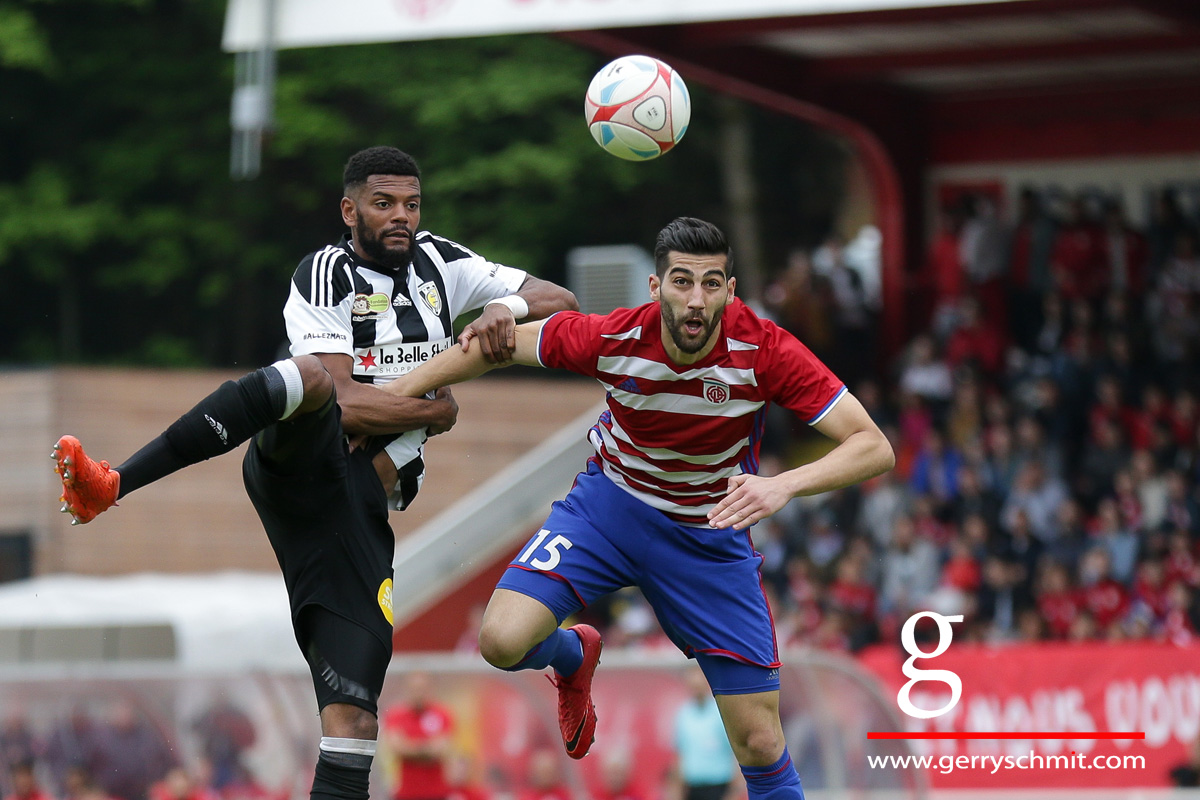 Duel between Ricky Delgado (Jeunesse Esch) and Samir Hadji (Fola Esch)