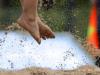 flying grains of Sand during a Beachvolleyball game at JPEE