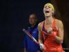 Katarzyna PITER of Poland reacts after her success against Yanina Wickmayer of Belgium