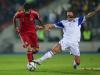 Maxime Chanot of Luxembourg tackles Diego Costa of Spain during EM Qualifying game