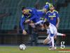 Vedad Ibisevic of Bosnia is challenged by Lars Gerson of Luxembourg during international friendly game