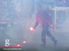 A Volunteer cleans of the pitch after Croatian fans threw pyro on the pitch